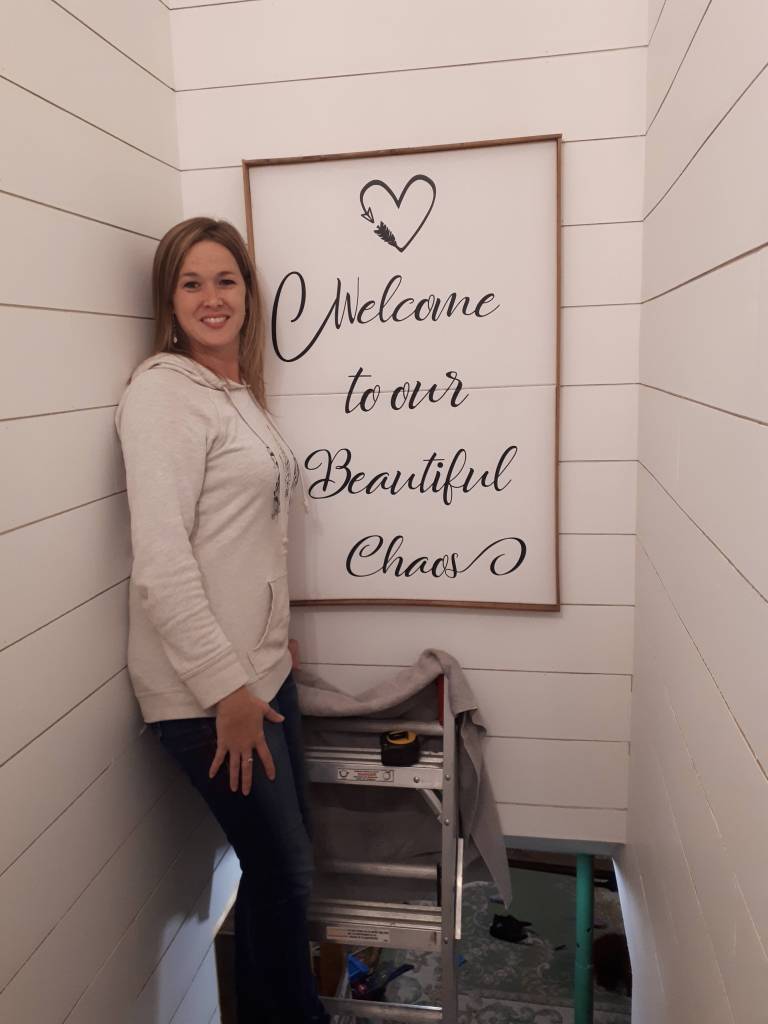 This image has an empty alt attribute; its file name is diy-faux-shiplap-stairwell-welcome-to-our-beautiful-chaos-sign.jpg